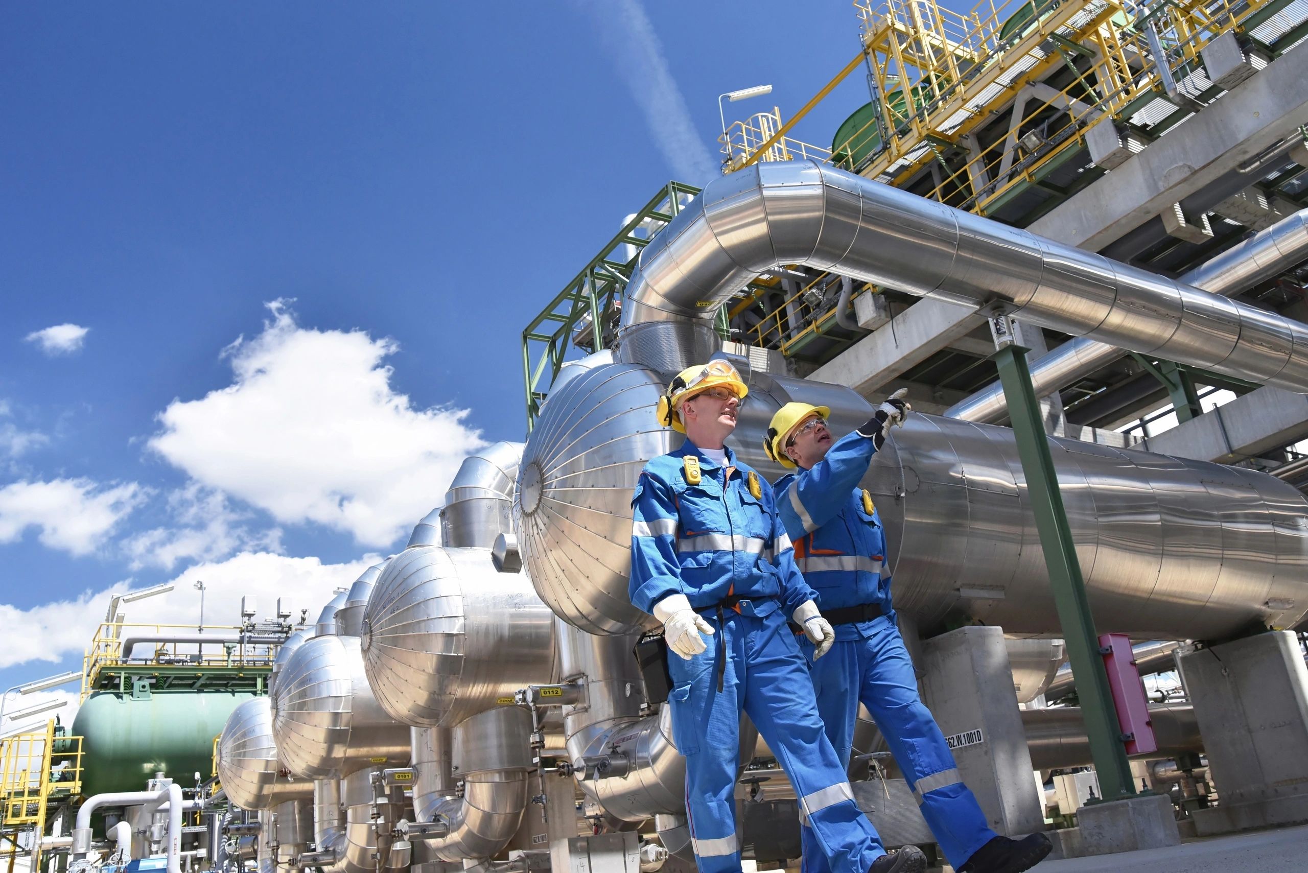 Oil and gas workers with safety equipment